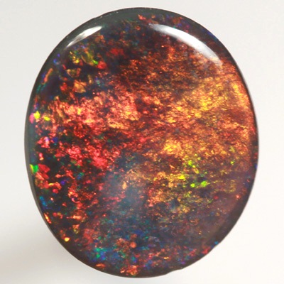 SOLID BLACK OPAL Burning golden fire, very bright! SEE VIDEO